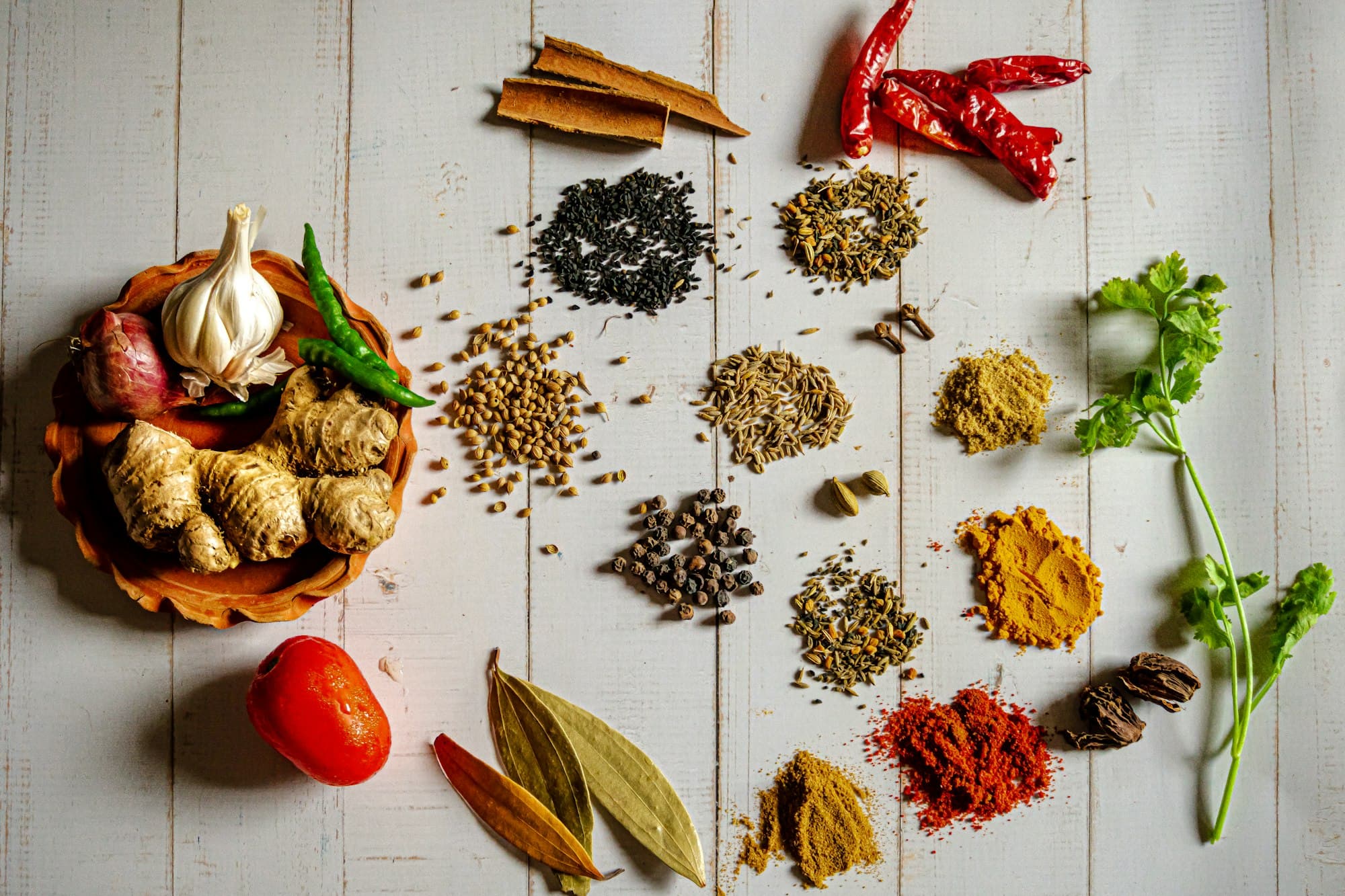 Fresh spices, ginger, garlic, and chillies for homemade flavour