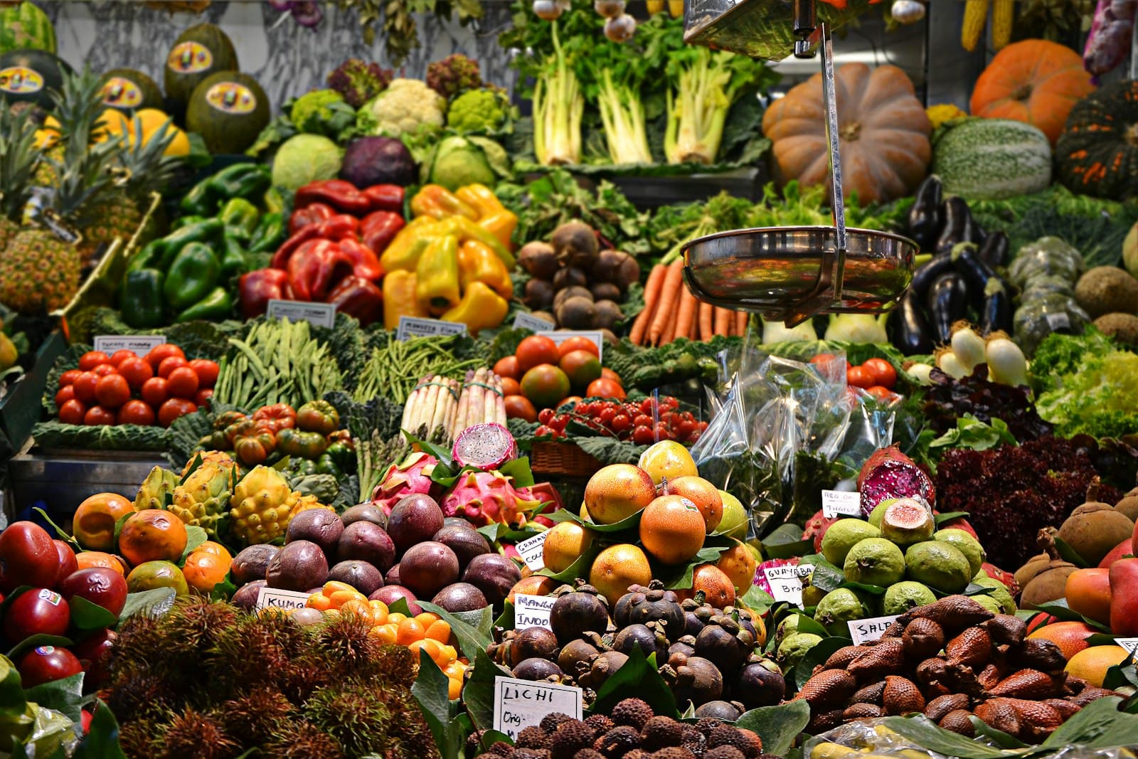 Abundant fresh produce at a vibrant market stall
